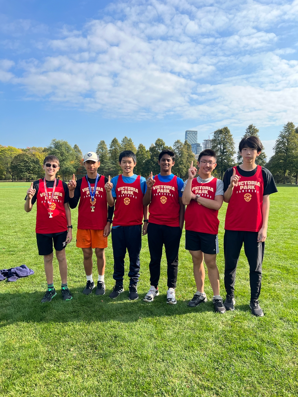 VPCI Runners lined up in the field posing. 